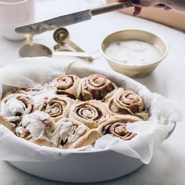 Instagram post by @moonjetty: Cinnamon rolls, iced while warm. These go fast on Sunday mornings — you've been warned 🍥